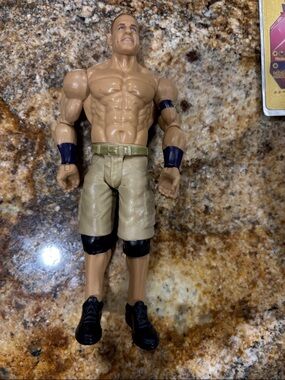 Action Figure with Tan Shorts and Black Accents
